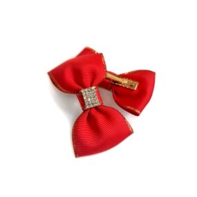 Elegancka spinka z kokardką i kryształkami, czerwona z ozdobnym złotym wykończeniem